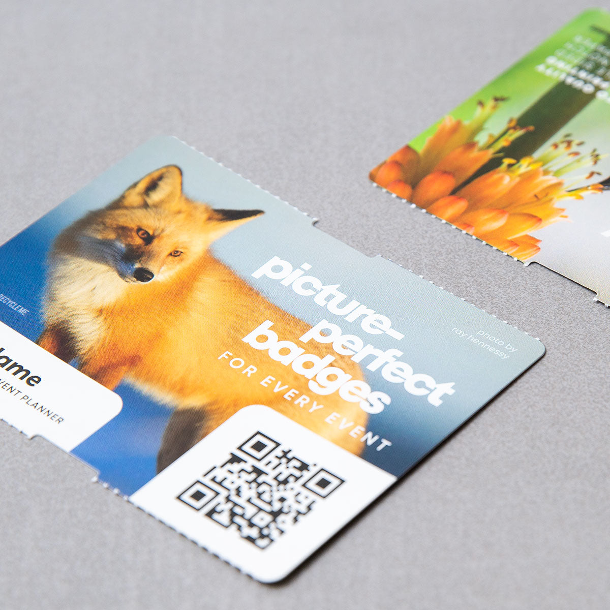 Elevate your brand with our 4x3 double-sided eco-friendly custom event badges. Crafted from premium 9.5 pt direct thermal paper, these personalized event badges offer durability and bring your designs to life with stunning detail and clarity. Elevate your brand with our 4x3 double-sided eco-friendly custom event badges. Crafted from premium 9.5 pt direct thermal paper, these personalized event badges offer durability and bring your designs to life with stunning detail and clarity.