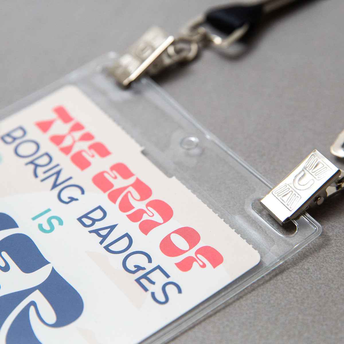 Elevate your promotional event, corporate conference, or trade show with recyclable 4x6 double-notch plastic name badge holders. Crafted from soft PVC, these durable badge sleeves offer ultra-clear visibility and pair perfectly with our custom name badges and lanyards.